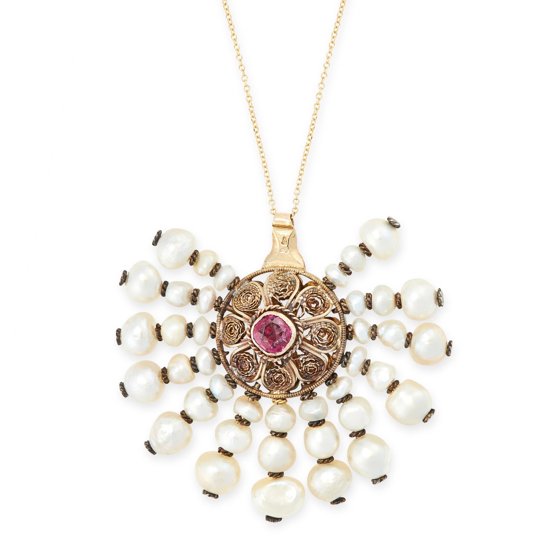 ANTIQUE NATURAL PEARL AND RUBY PENDANT in yellow gold, set with a cushion cut ruby, accented by rows