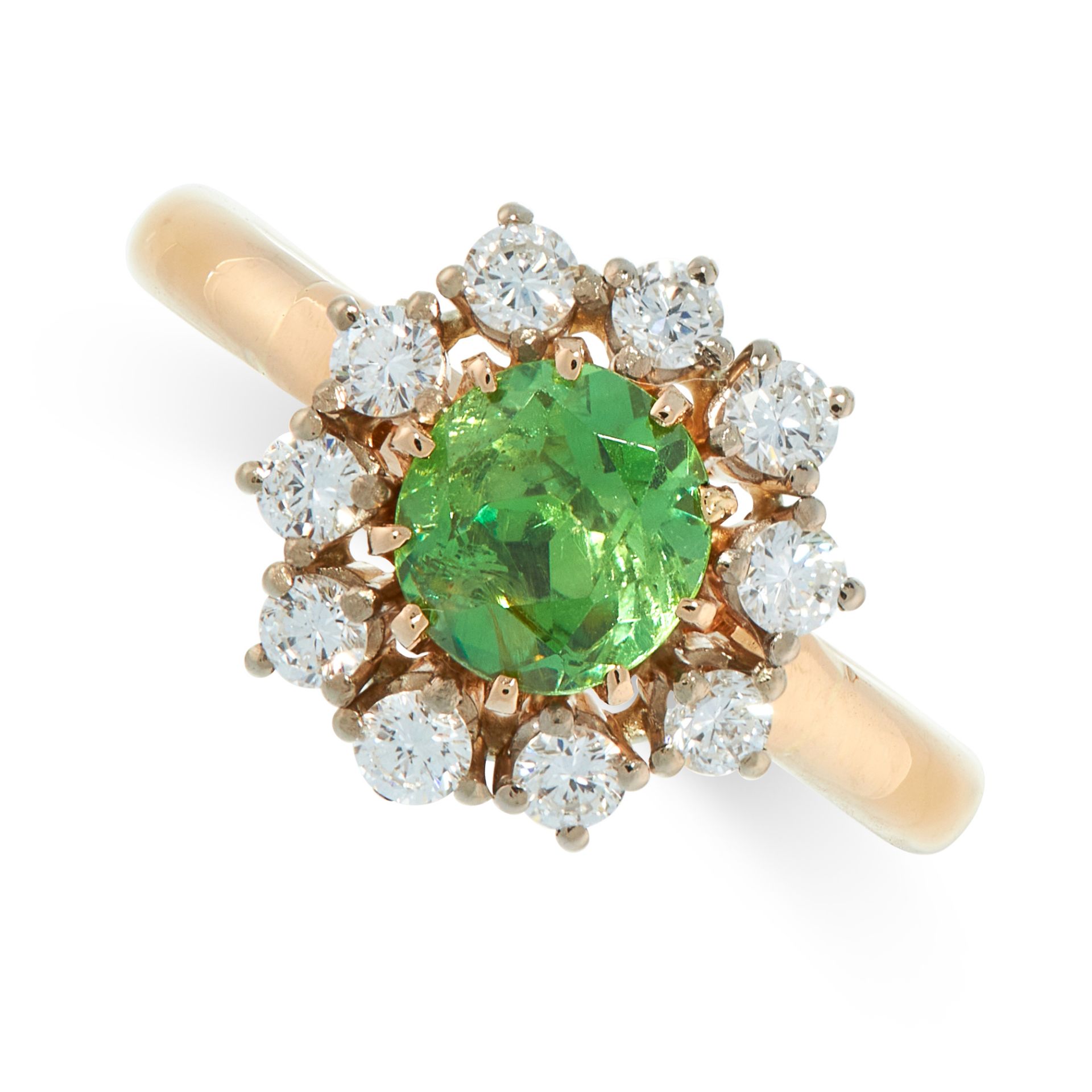DEMANTOID AND DIAMOND RING set with a cushion cut demantoid garnet of 1.06 carats within a border of