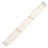 CULTURED PEARL AND DIAMOND BRACELET composed of three rows of cultured pearls measuring 5.4mm,