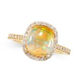 OPAL AND DIAMOND RING in 18ct yellow gold, set with a cushion-shaped cabochon opal in a border of