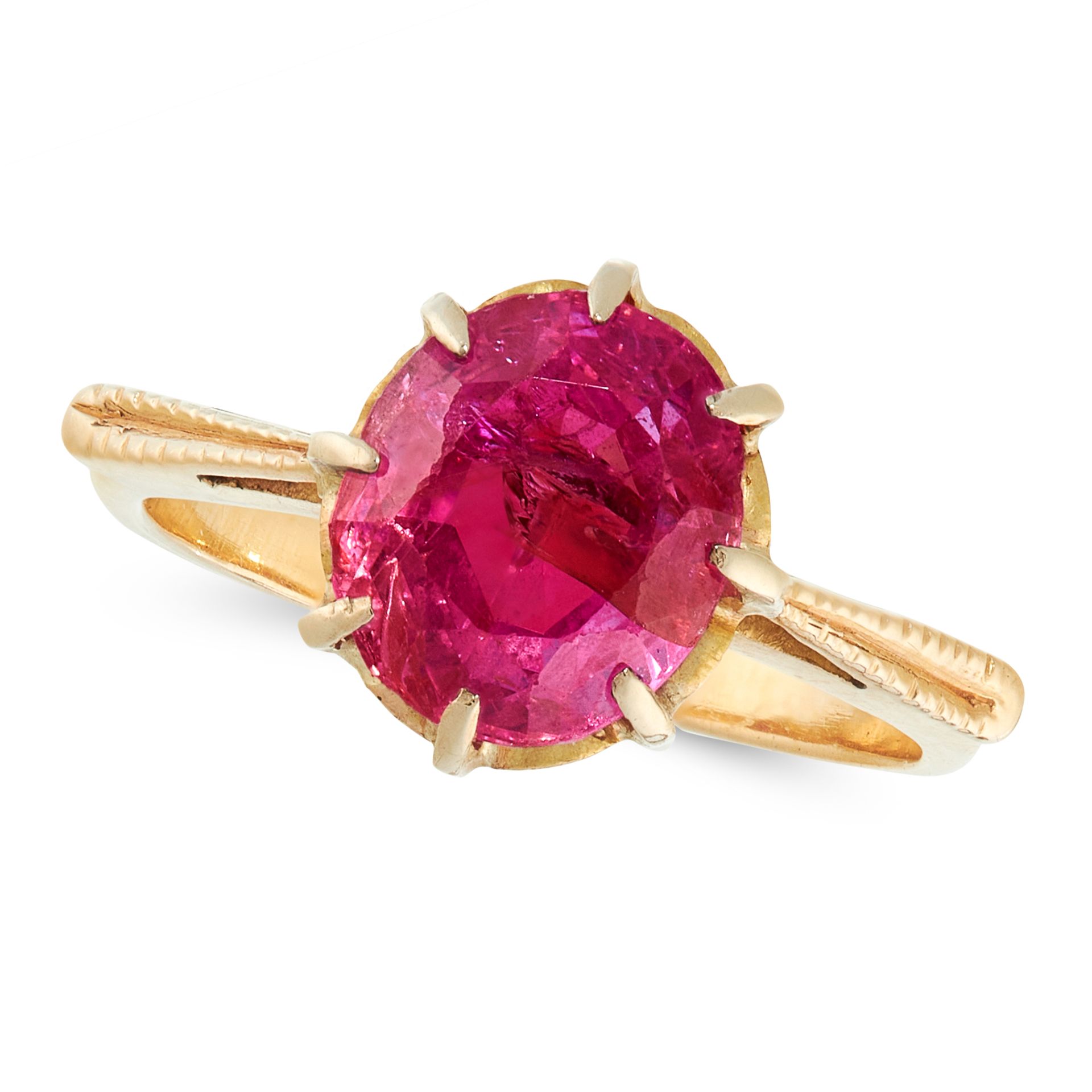 BURMA NO HEAT RUBY DRESS RING in high carat yellow gold, set with an oval cut ruby of 2.53 carats,