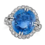 SAPPHIRE AND DIAMOND RING, EARLY 20TH CENTURY in 18ct white gold, set with a cushion cut blue