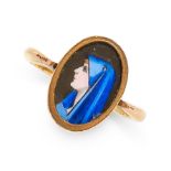 ANTIQUE ENAMEL ST FABIOLA RING in yellow gold, the oval face containing a painted enamel miniature