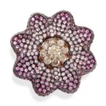 A PINK SAPPHIRE AND DIAMOND RING in the form of a marigold flower, set with a central cluster of