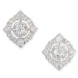 A PAIR OF DIAMOND EARRINGS set with a central old cut diamond in a cluster of further old cut