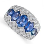 A SAPPHIRE AND DIAMOND RING in 18ct white gold, set with a row of graduated oval cut sapphires,
