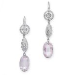 A PAIR OF PINK TOPAZ AND DIAMOND EARRINGS each set with an oval cut pink topaz below four round