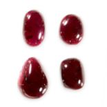 A MIXED LOT OF UNMOUNTED GARNETS of various cuts, totalling 63.00 carats.