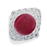 A BURMA NO HEAT RUBY AND DIAMOND RING set with a cabochon ruby of 6.00 carats in a diamond shaped