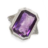 AN AMETHYST INTAGLIO RING the rectangular face set with an emerald cut amethyst intaglio, carved