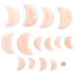 A MIXED LOT OF UNMOUNTED CORAL carved as crescent moons, totalling 39.70 carats, 7.9g.