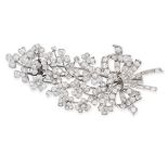 A VINTAGE DIAMOND FLOWER SPRAY BROOCH designed as a bouquet of flowers tied with a ribbon, set