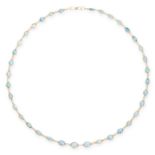 AN AQUAMARINE CHAIN NECKLACE comprising of a single row of oval cut aquamarines between fine chain