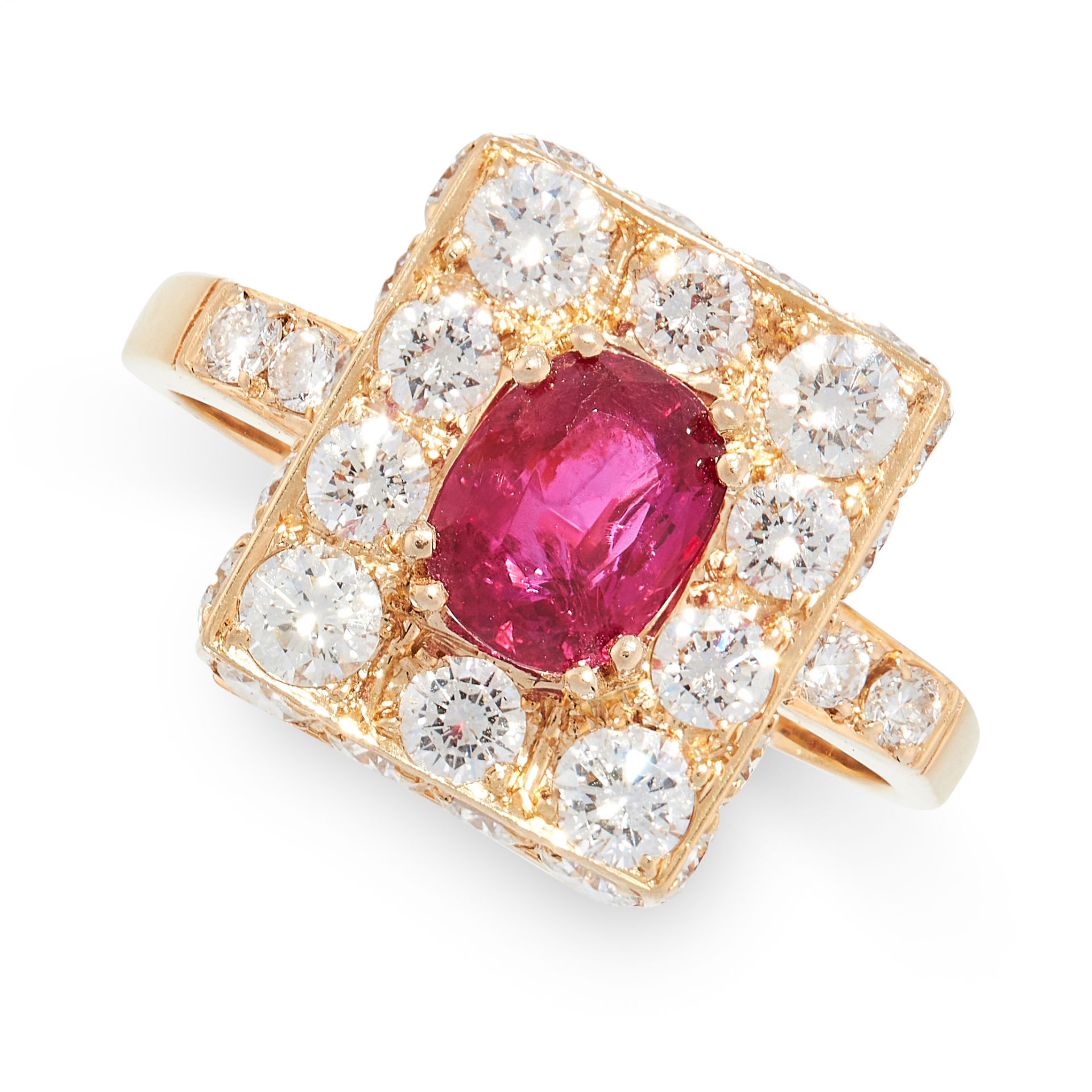 AN UNHEATED RUBY AND DIAMOND RING the rectangular face set with an oval cushion cut ruby of 1.38