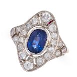 A SAPPHIRE AND DIAMOND RING in 18ct yellow gold and platinum, the navette shaped face set with an