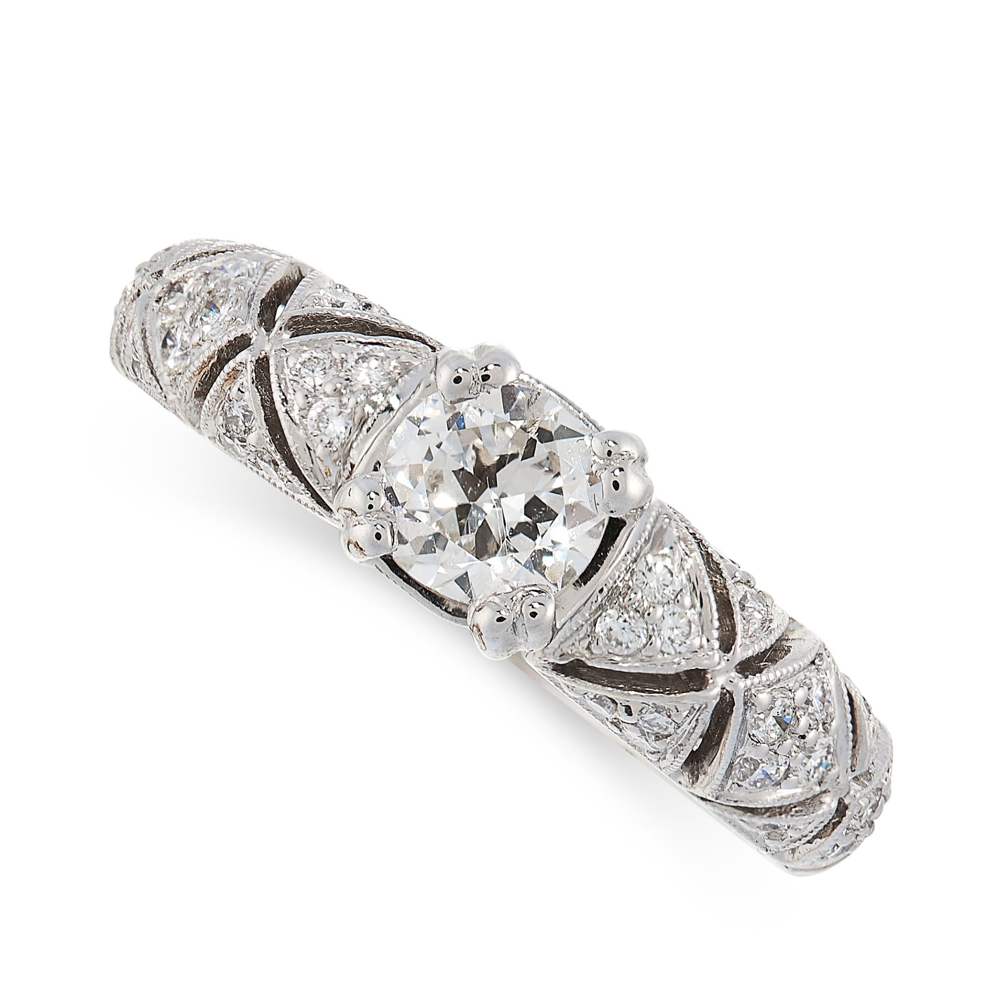 A DIAMOND RING in 18ct white gold, set with a central round cut diamond of 0.51 carats on a tapering