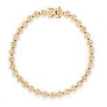 A DIAMOND LINE BRACELET in 18ct yellow gold, comprising of a single row of bezel set round cut