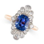 A COLOUR CHANGE SAPPHIRE AND DIAMOND RING in 18ct yellow gold and platinum, the navette face set