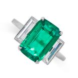 A COLOMBIAN EMERALD AND DIAMOND RING set with an octagonal cut emerald of 2.78 carats between two