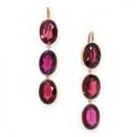 A PAIR OF ANTIQUE GARNET EARRINGS in yellow gold, each set with a trio of articulated oval cut