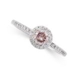 A NATURAL FANCY INTENSE PINK DIAMOND AND WHITE DIAMOND RING set with a round cut fancy intense