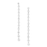 A PAIR OF DIAMOND DROP EARRINGS in 18ct white gold, each comprising a row of articulated links set