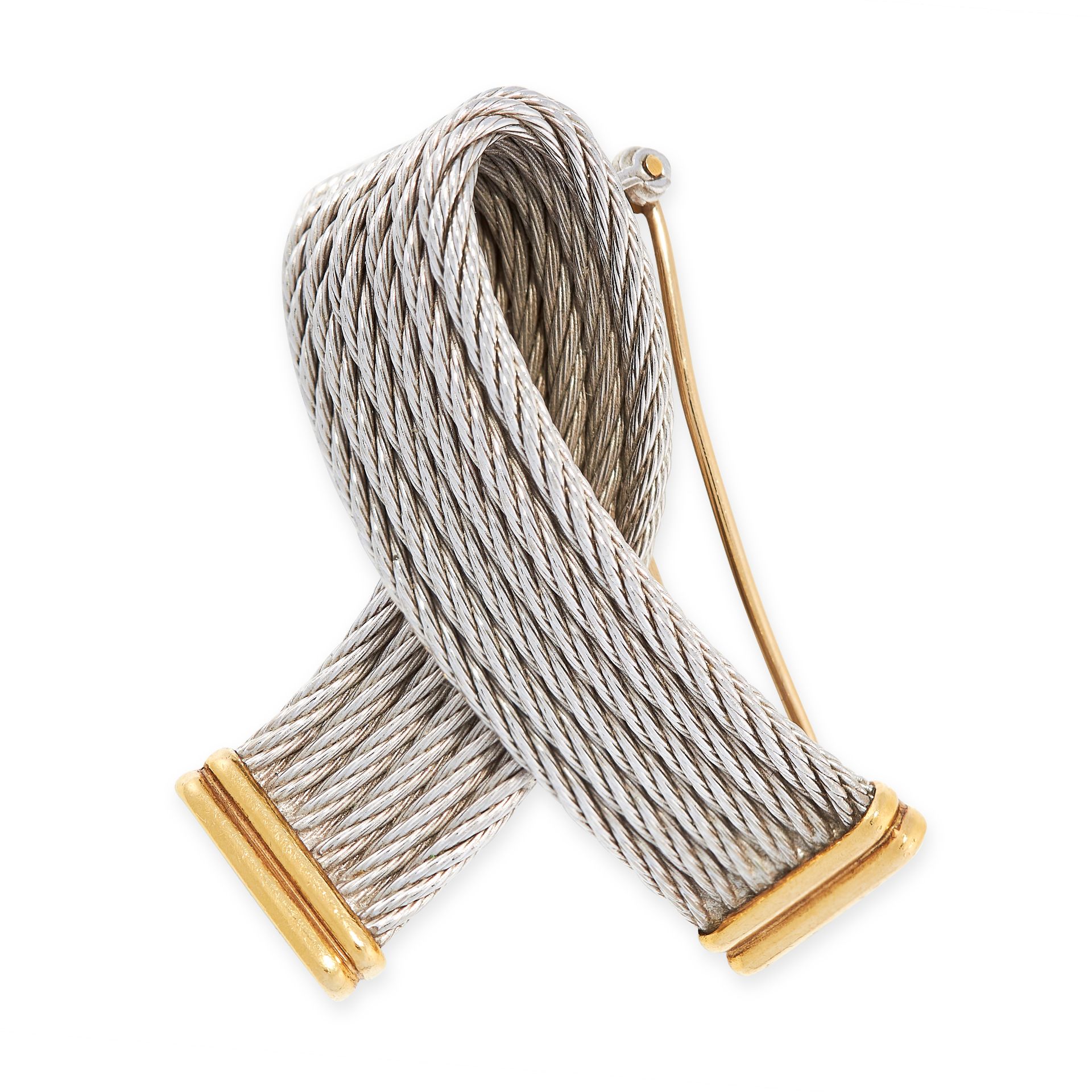 A VINTAGE FORCE 10 RIBBON BROOCH, FRED in 18ct yellow gold and steel, designed as a curled ribbon