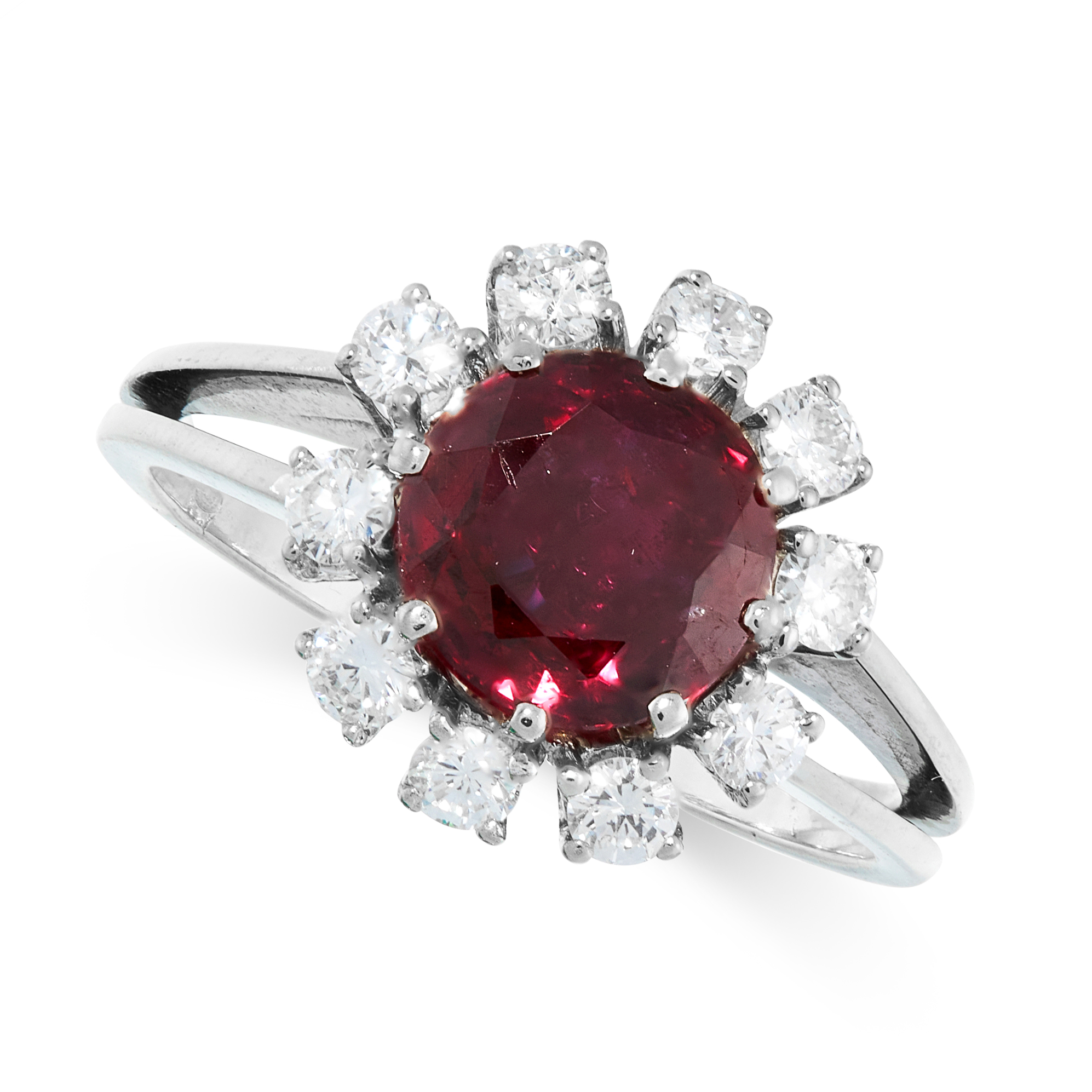 AN UNHEATED RUBY AND DIAMOND RING set to the centre with a round cut ruby of 2.32 carats, within a