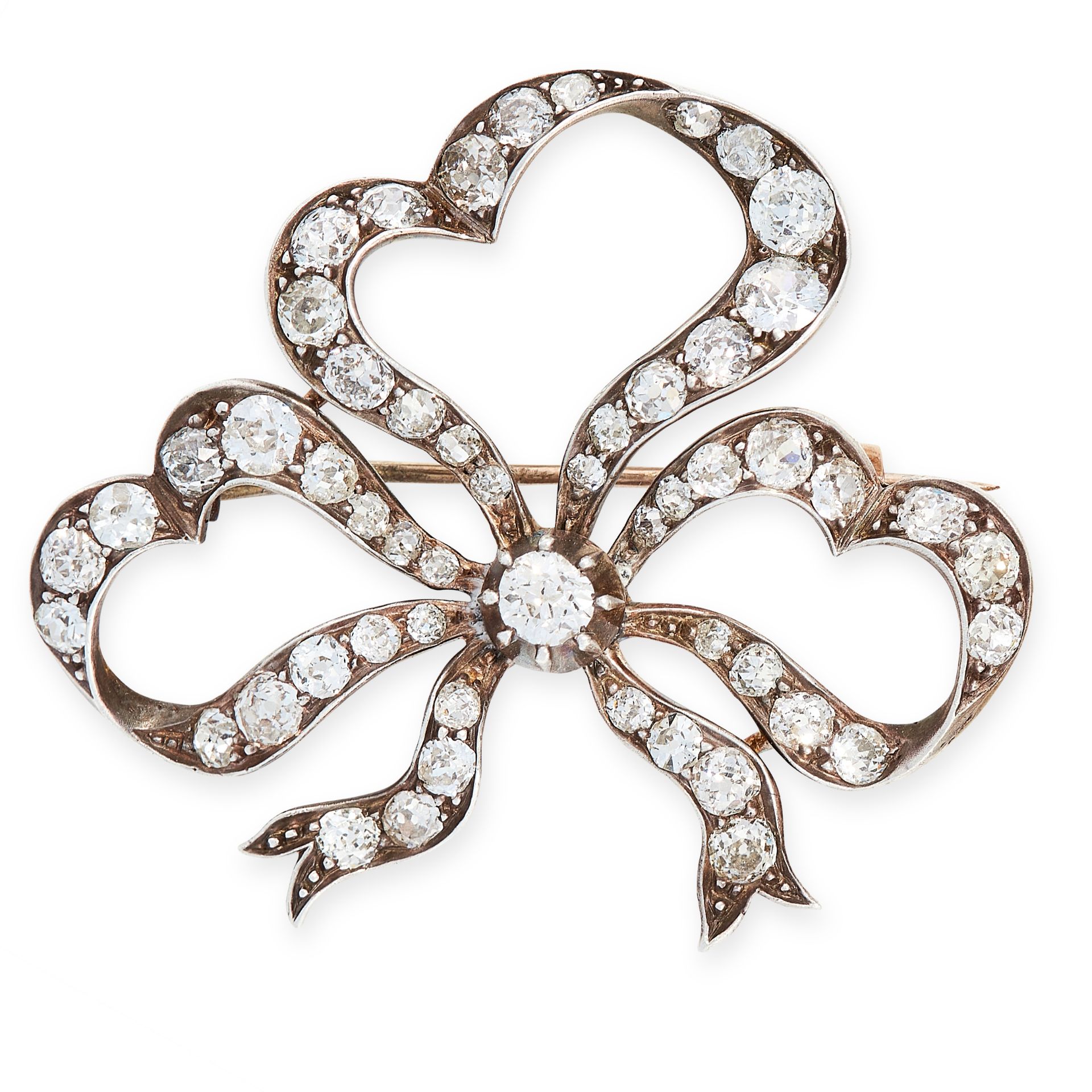 AN ANTIQUE DIAMOND BROOCH, 19TH CENTURY in yellow gold and silver, designed as a ribbon tied in a