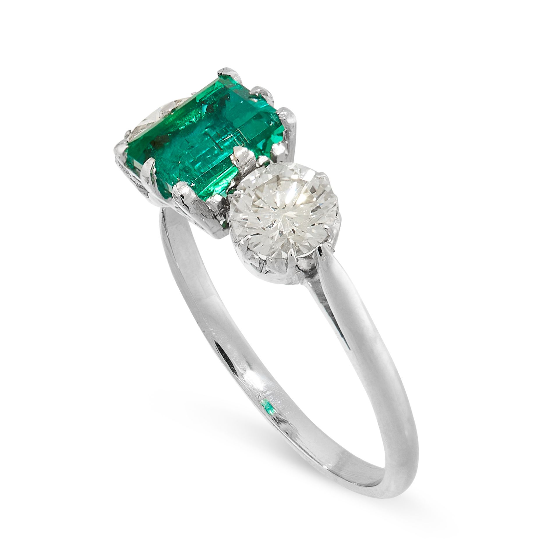 AN EMERALD AND DIAMOND DRESS RING set with a rectangular step cut emerald of 1.19 carats, between - Image 2 of 2