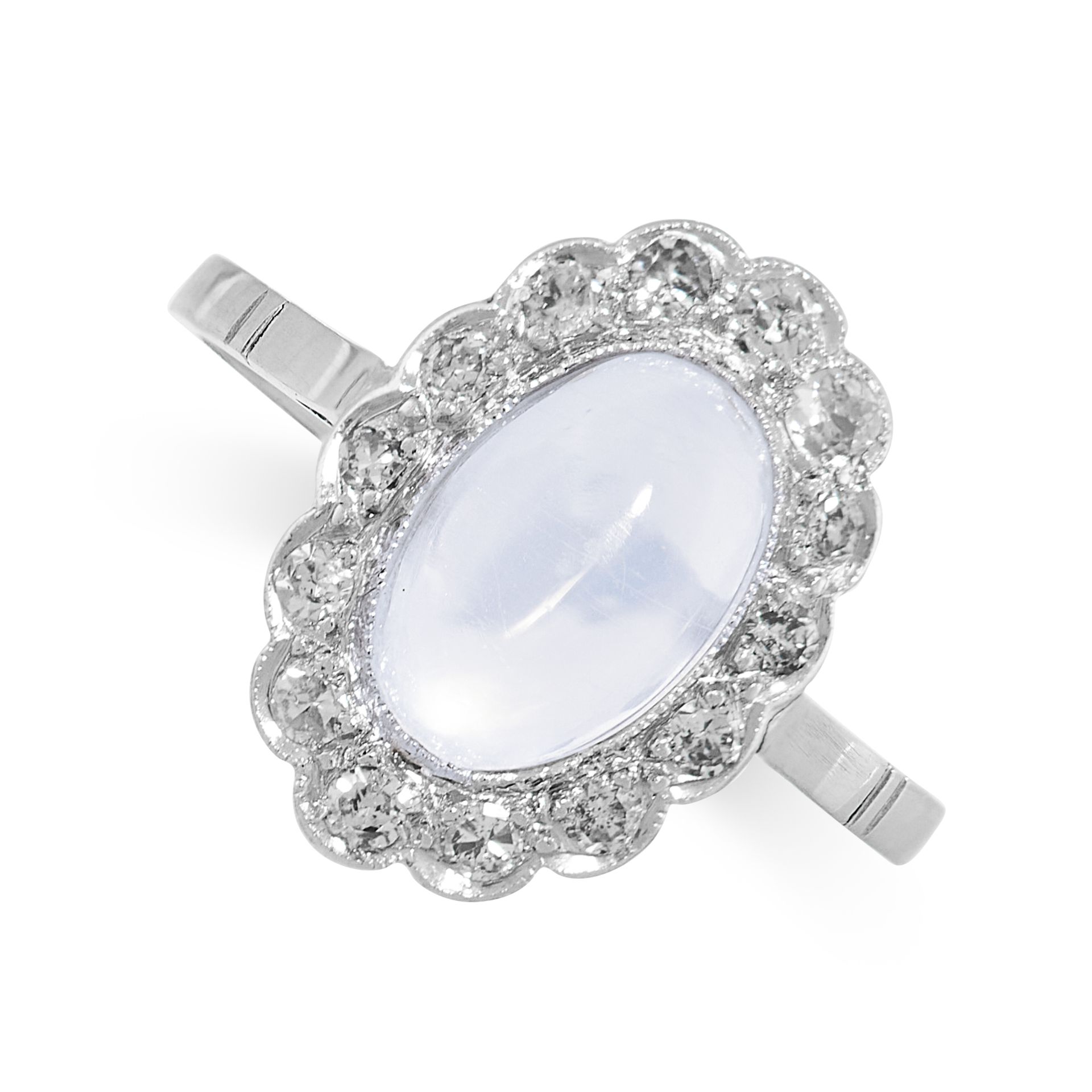 A MOONSTONE AND DIAMOND DRESS RING in platinum, set with an oval cabochon moonstone within a