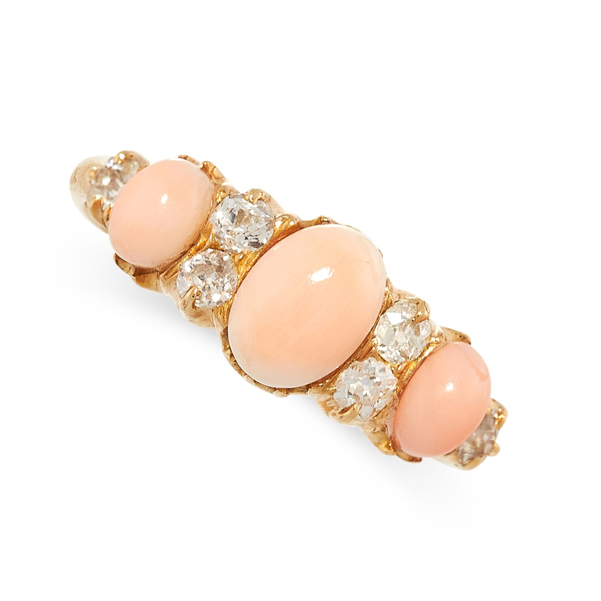 A CORAL AND DIAMOND RING in yellow gold, set with three graduated polished coral beads, accented