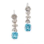 A PAIR OF BLUE ZIRCON AND DIAMOND EARRINGS each set with an emerald cut blue zircon suspended