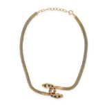 AN ANTIQUE SAPPHIRE AND DIAMOND SNAKE NECKLACE in yellow gold, designed as two coiled snakes,