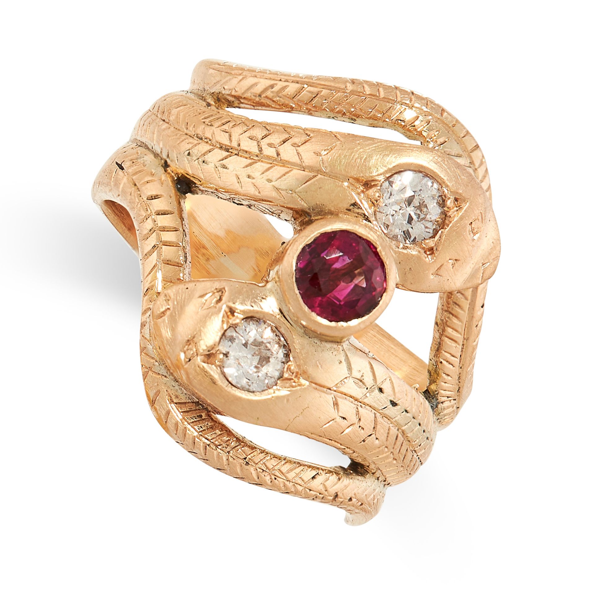 A RUBY AND DIAMOND SNAKE RING in yellow gold, the band designed as two snakes, coiled around each