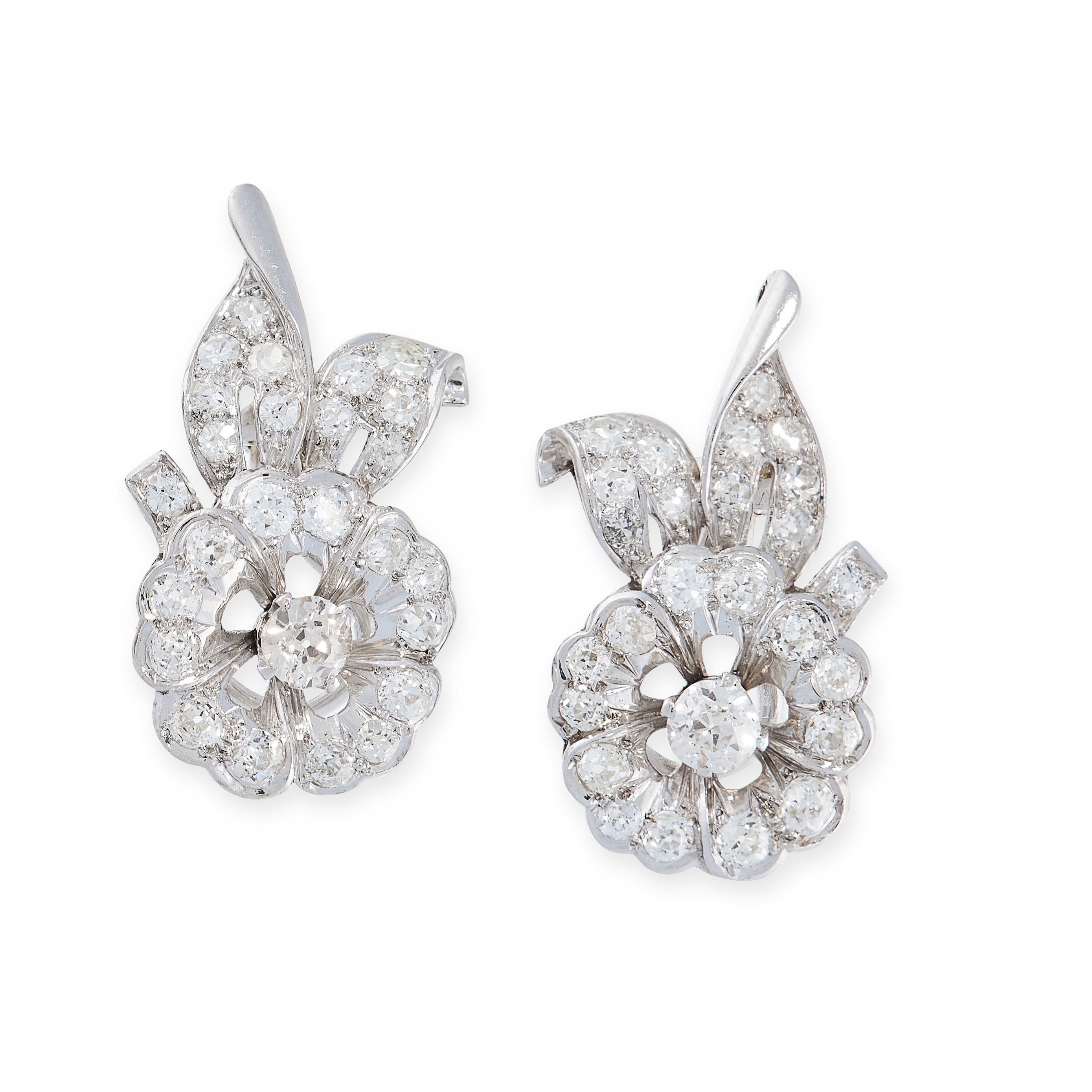 A PAIR OF VINTAGE DIAMOND CLIP EARRINGS each designed as a flower, set throughout with old cut and
