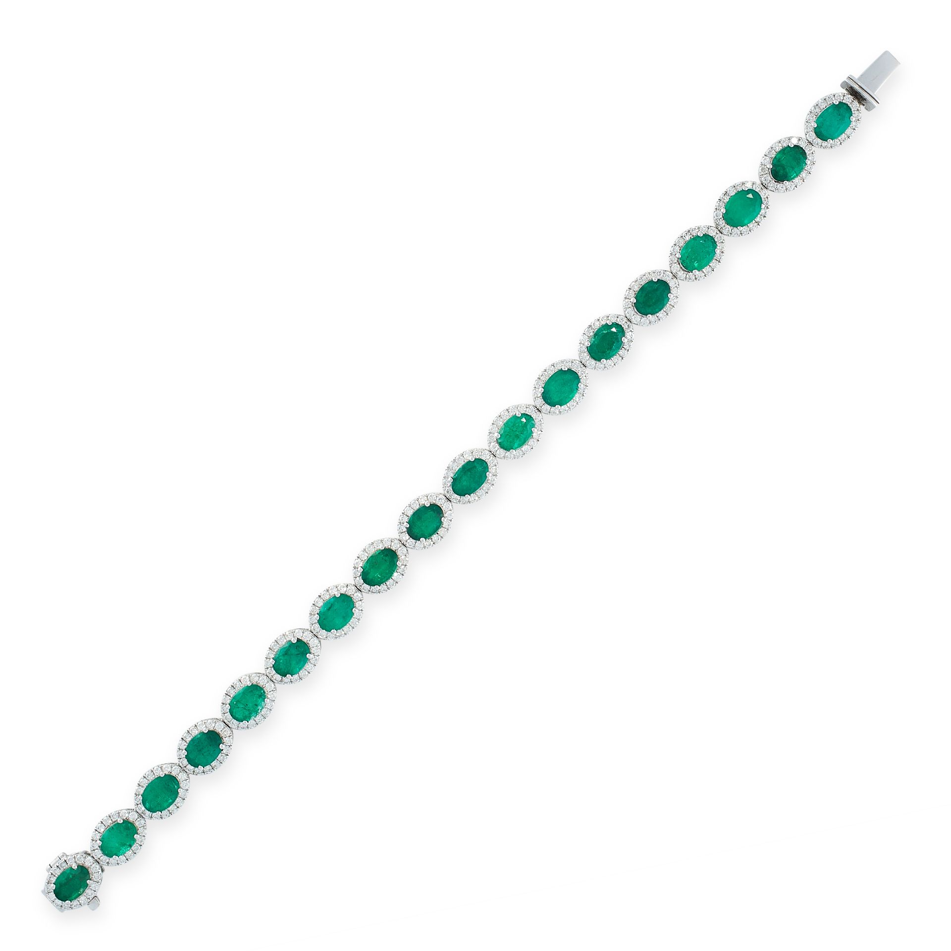 AN EMERALD AND DIAMOND BRACELET in 18ct white gold, set with a series of eighteen oval cut emeralds,