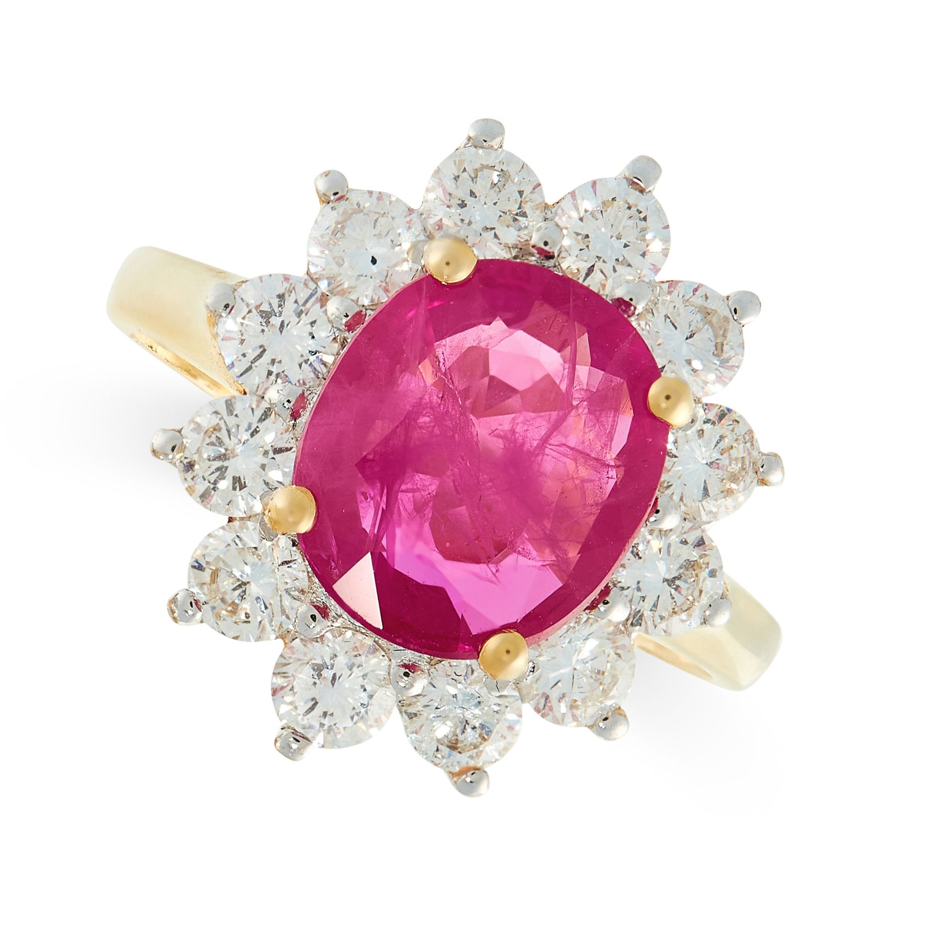 A RUBY AND DIAMOND DRESS RING in 18ct yellow gold, set with a cushion cut ruby of 2.85 carats,