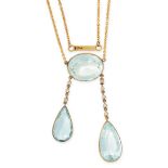 AN AQUAMARINE AND DIAMOND LAVALIER NECKLACE, EARLY 20TH CENTURY in 18ct yellow gold, set with an