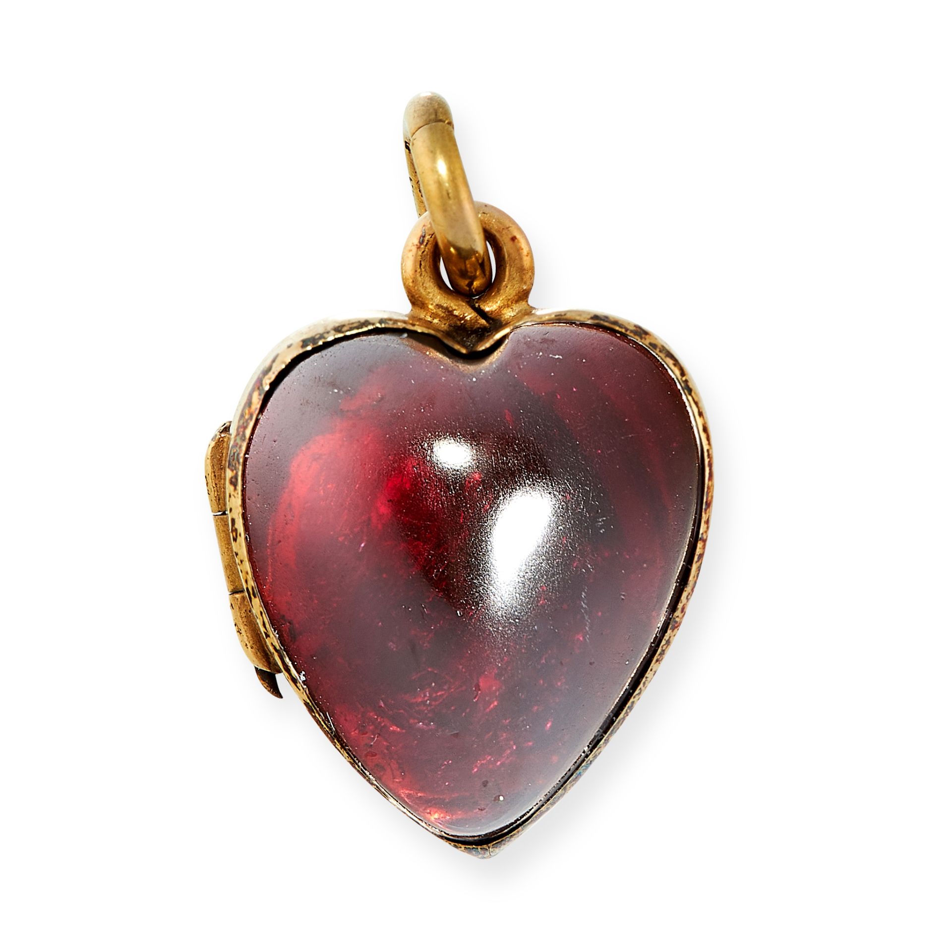 AN ANTIQUE GARNET MOURNING LOCKET PENDANT, 19TH CENTURY in 15ct yellow gold, the hinged heart shaped