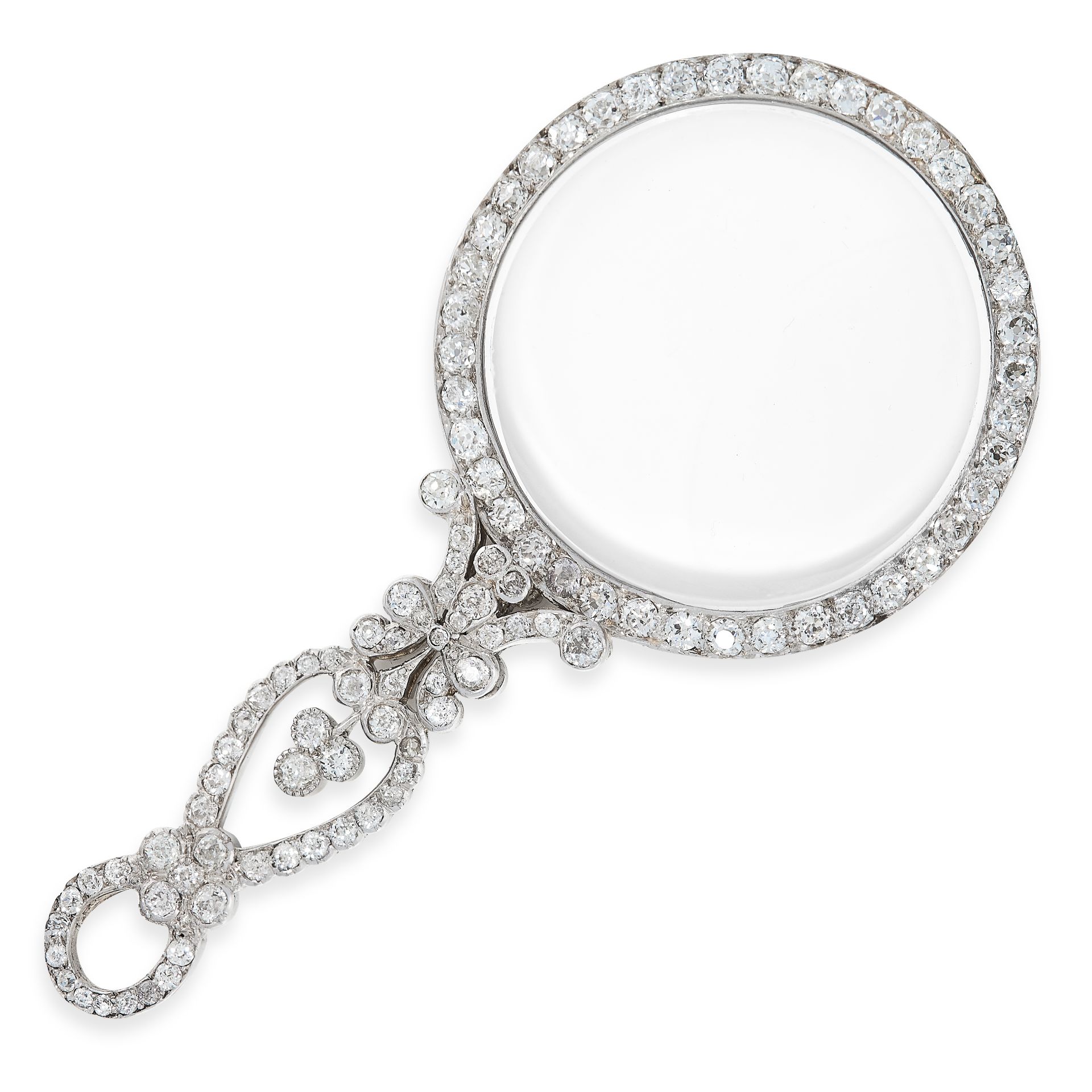 AN ART DECO DIAMOND EYE GLASS / LORGNETTE the circular lens within a border of old cut diamonds,