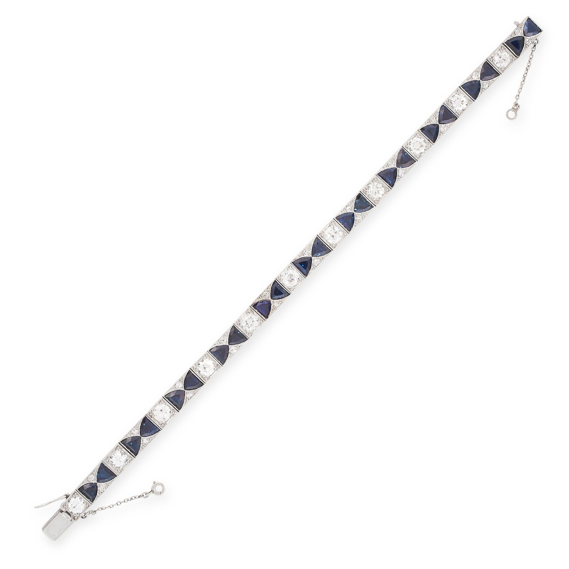 A FINE ART DECO SAPPHIRE AND DIAMOND BRACELET in platinum, set with a row of eleven principal old