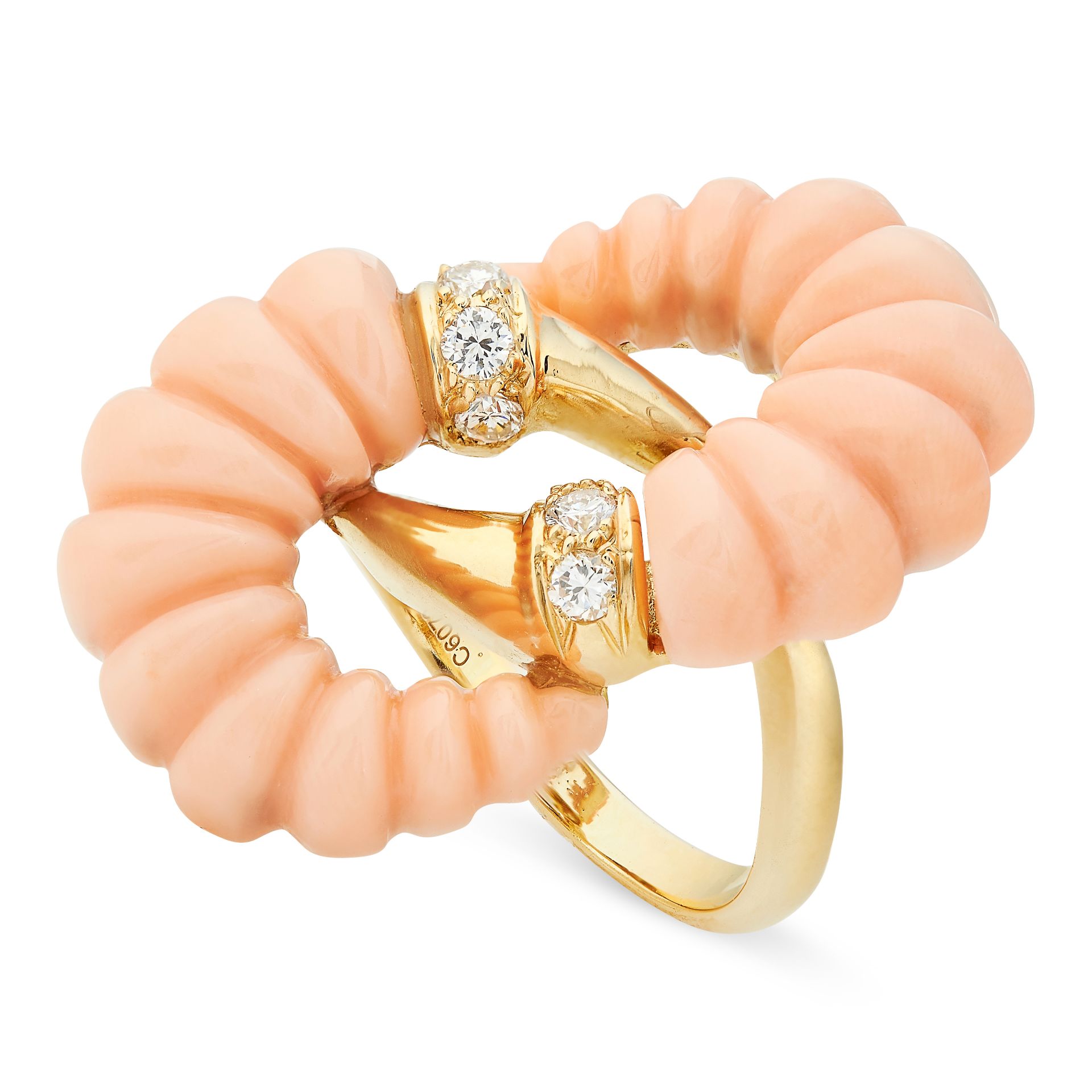 A VINTAGE CORAL AND DIAMOND RING, VAN CLEEF & ARPELS in 18ct yellow gold, the face formed of two