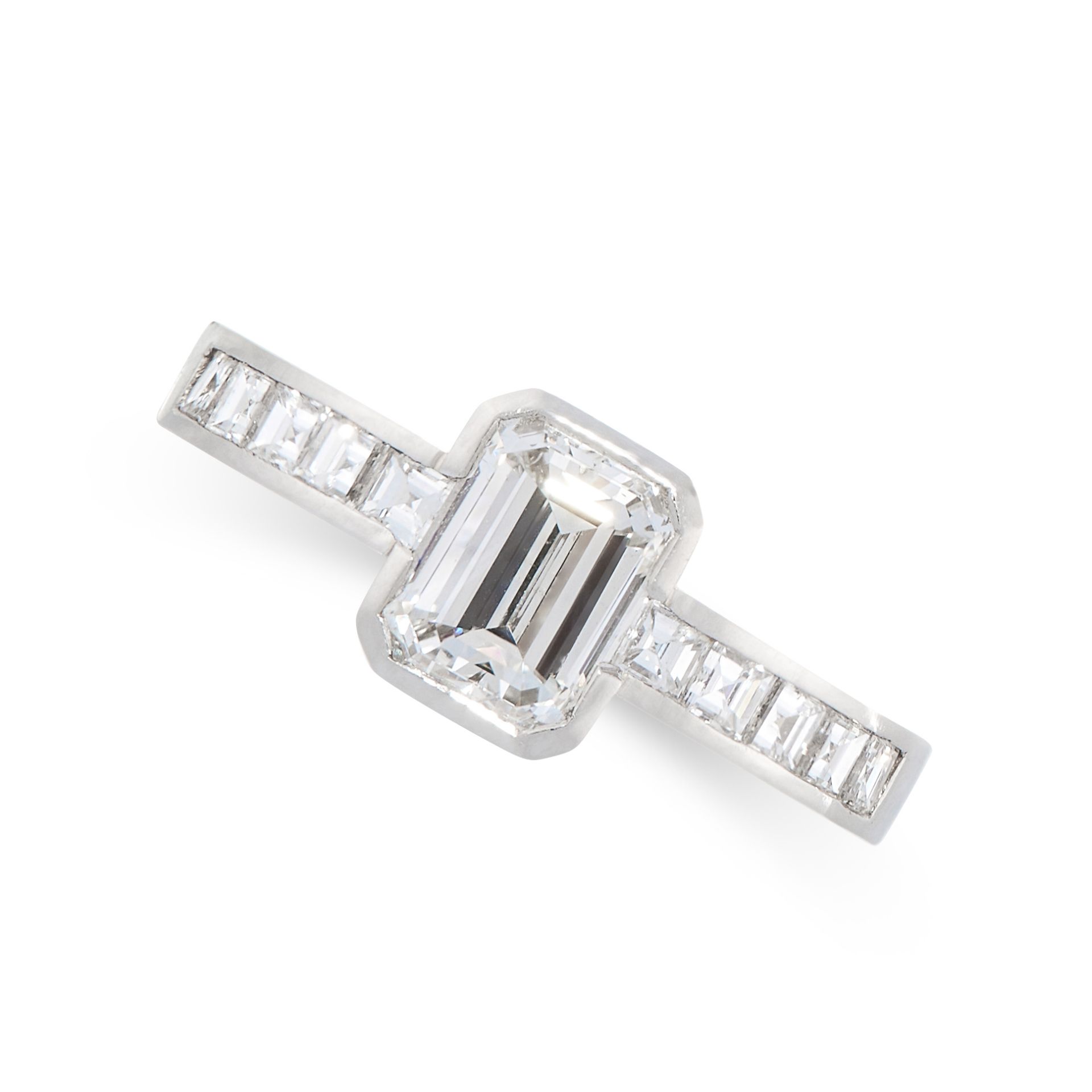 A DIAMOND ENGAGEMENT RING in platinum, set with a central emerald cut diamond of 1.33 carats,