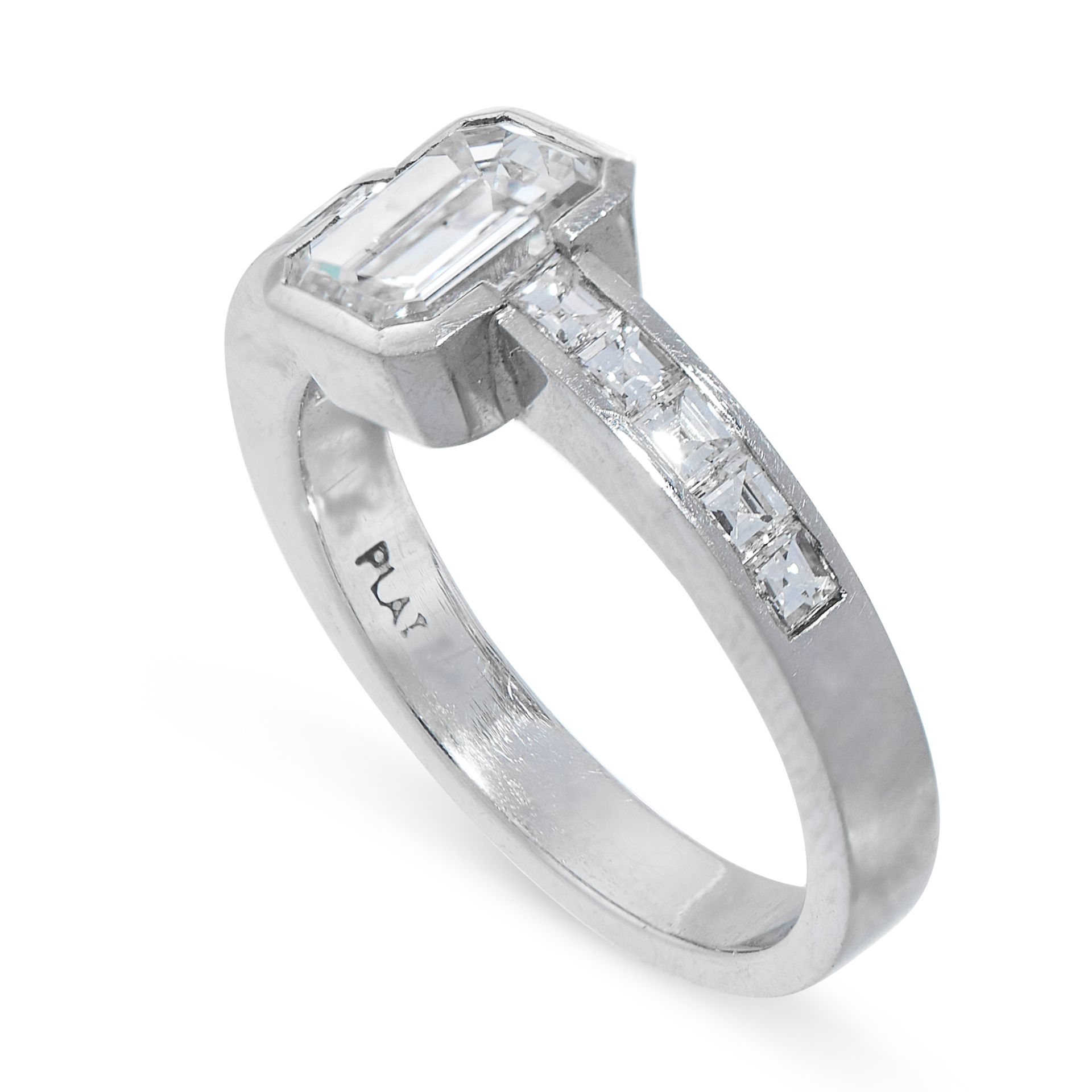 A DIAMOND ENGAGEMENT RING in platinum, set with a central emerald cut diamond of 1.33 carats, - Image 2 of 2