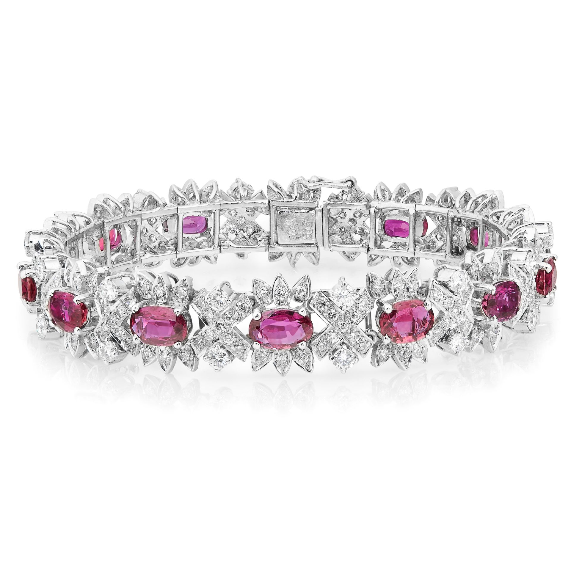 AN UNHEATED RUBY AND DIAMOND BRACELET in 14ct white gold, set with a row of fourteen oval cut and - Image 2 of 2