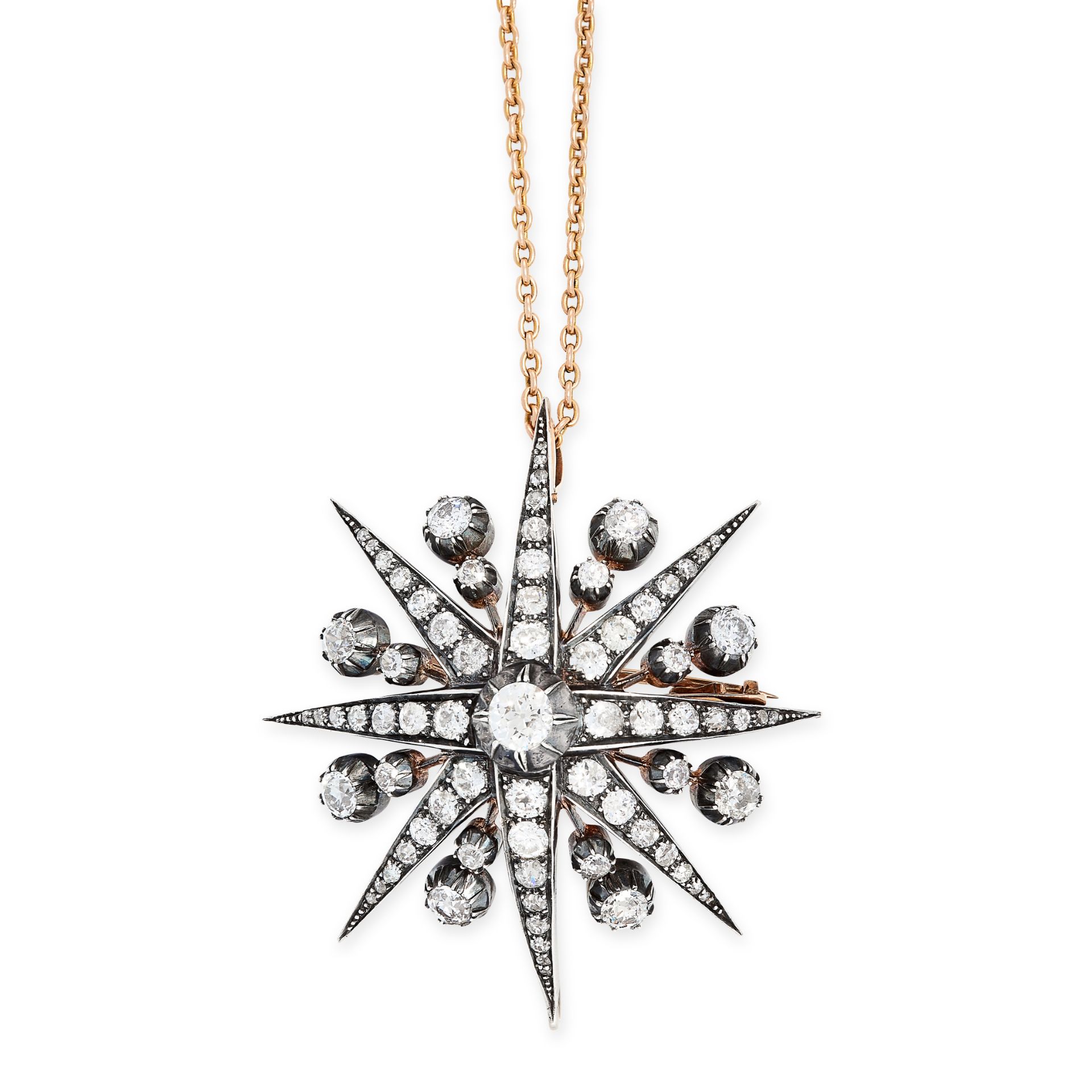 A FINE ANTIQUE DIAMOND STAR BROOCH / PENDANT AND CHAIN, 19TH CENTURY in yellow gold and silver,