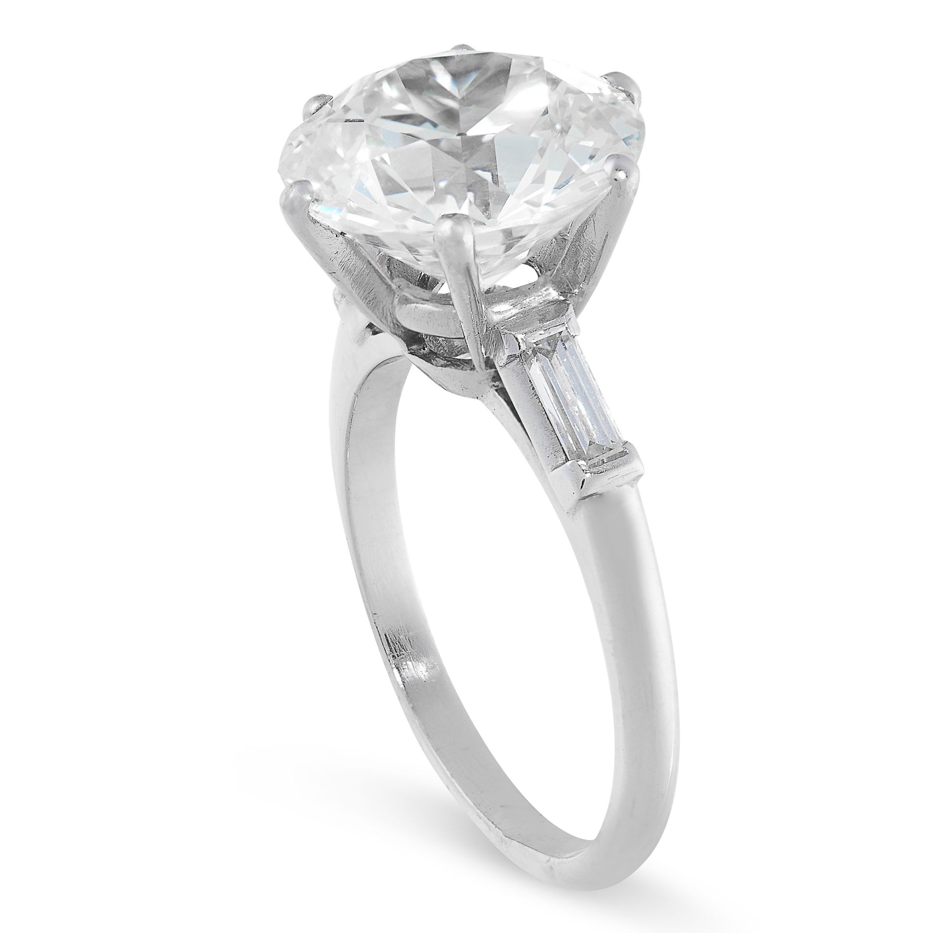 A SOLITAIRE DIAMOND ENGAGEMENT RING set with an old European cut diamond 5.91 carats, between two - Image 2 of 2