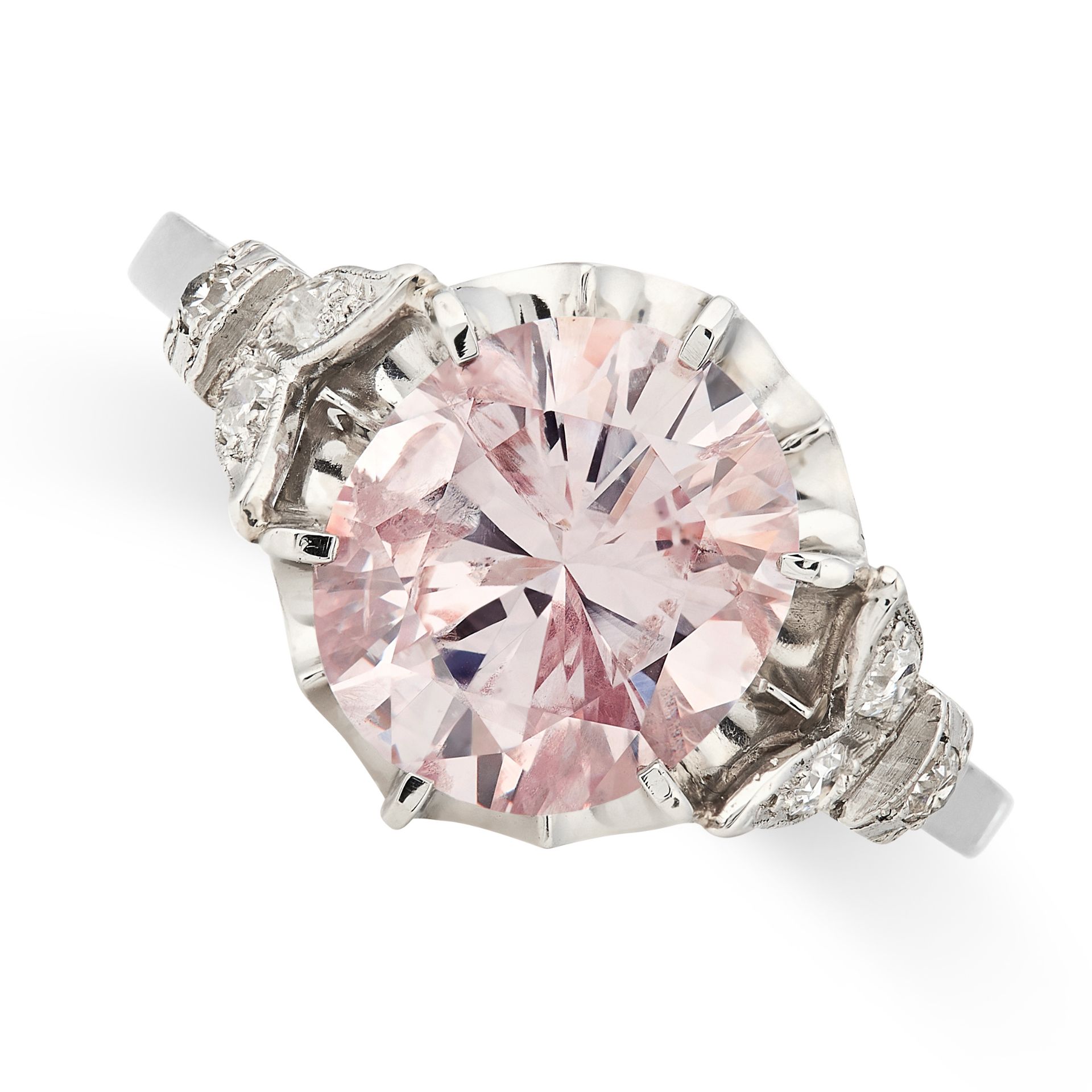 A NATURAL FANCY PURPLISH PINK DIAMOND AND WHITE DIAMOND RING set with an oval cut fancy purplish