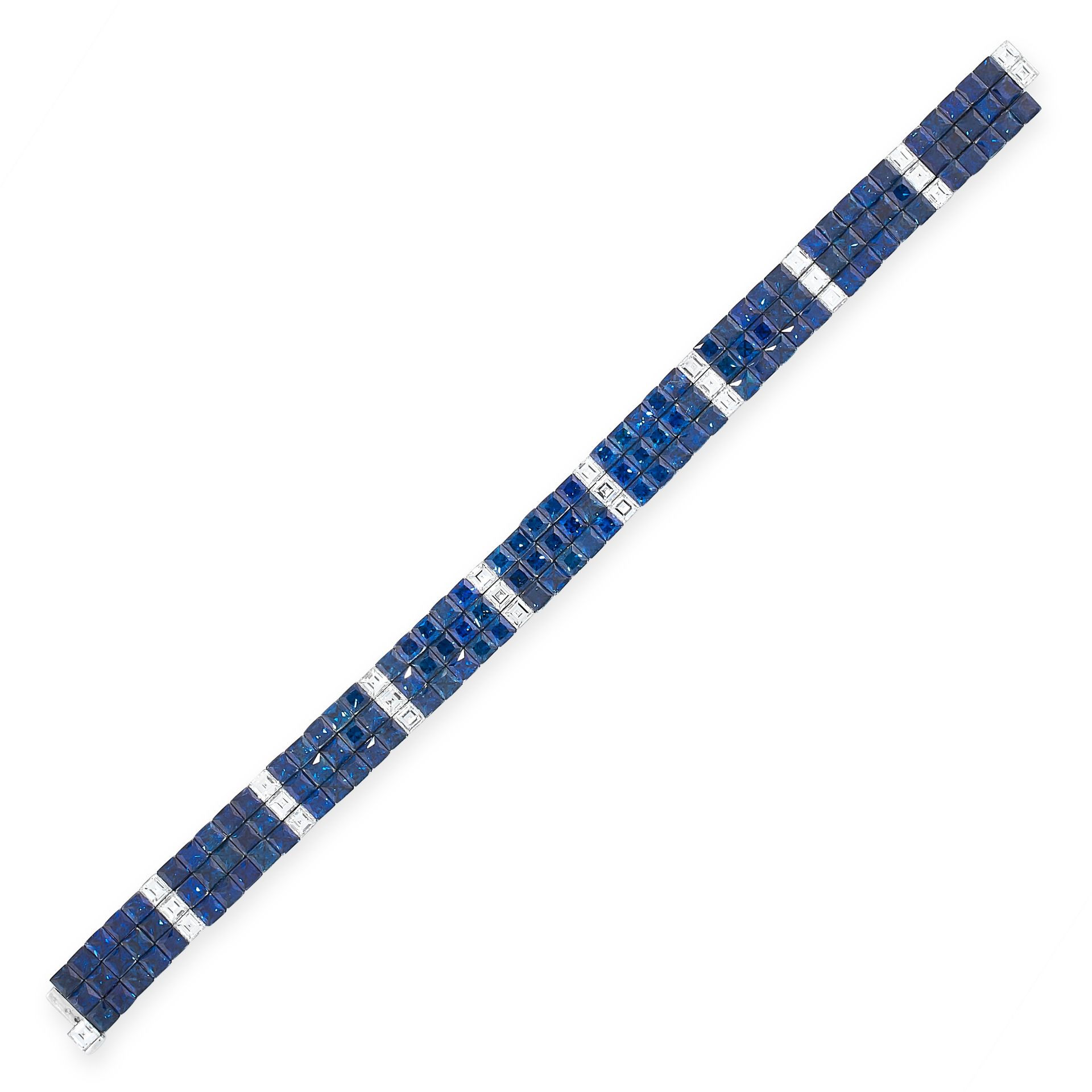 AN EXCEPTIONAL SAPPHIRE AND DIAMOND BRACELET in platinum, of strap design, mystery set with three